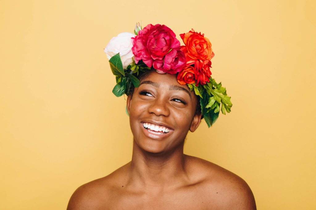 Woman wearing floral hairpiece